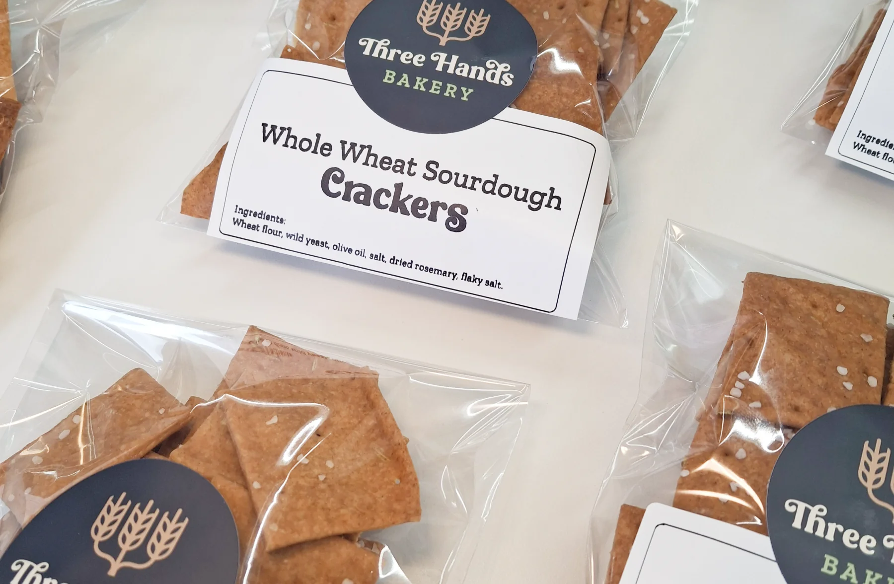 A batch of Three Hands Bakery Whole Wheat Sourdough Crackers