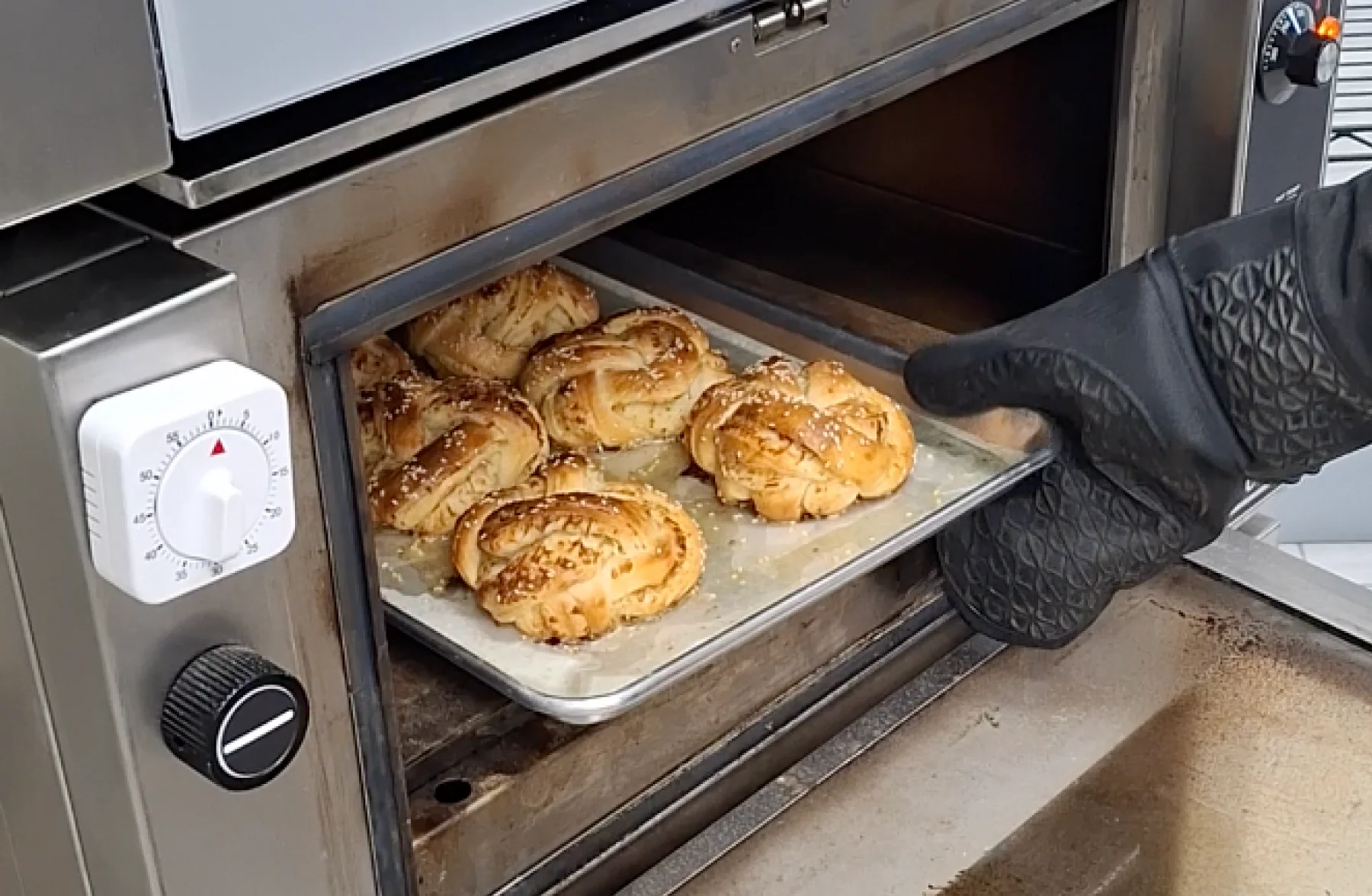 The Three Hands Bakery team baking bread in the very early morning hours