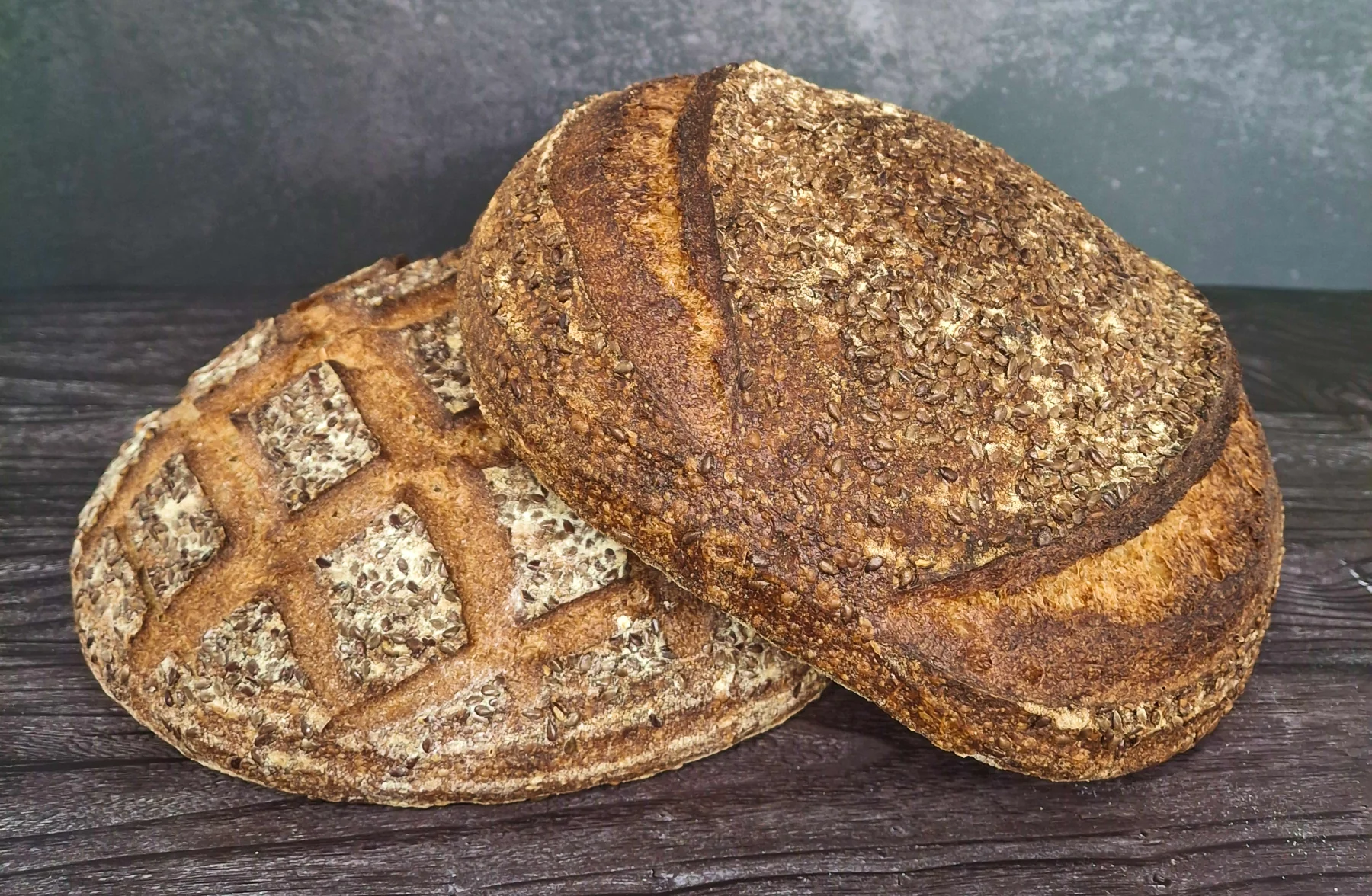 A multigrain sourdough loaf rolled in flax seed